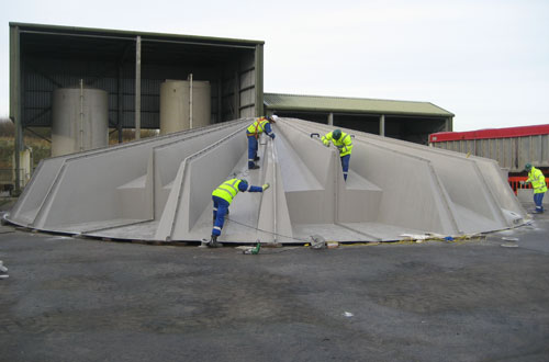 Site assembly of GRP cover.